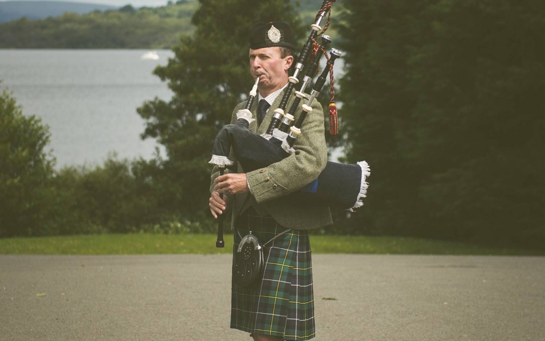 Scottish Piper Wedding playing bagpipes